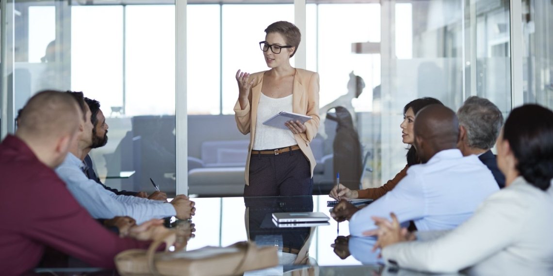 Businesswoman presenting project in meeting room 683773380 5b2de515fa6bcc0036f0c526.jpg