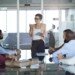 Businesswoman presenting project in meeting room 683773380 5b2de515fa6bcc0036f0c526.jpg