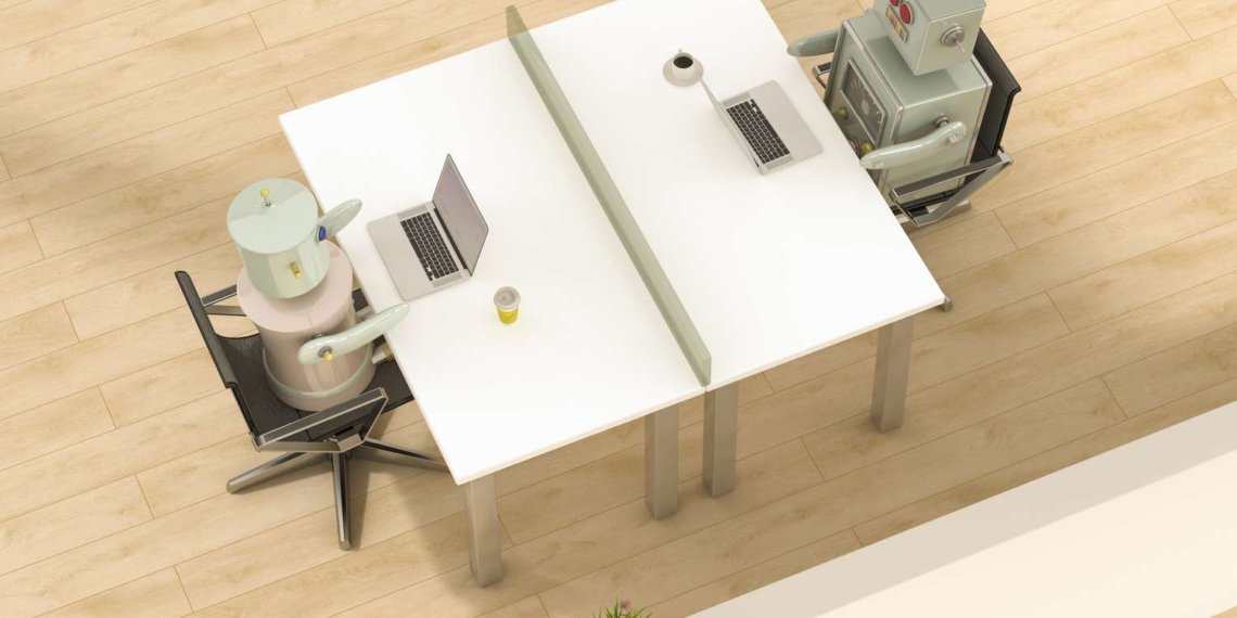 Robots working laptops on desks 634476931 5b1d12aa3de42300379fab04.jpg