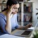 Worried young woman working on laptop at home 1221479965 5a1173eda99c4bc4828d24a62903195d.jpg